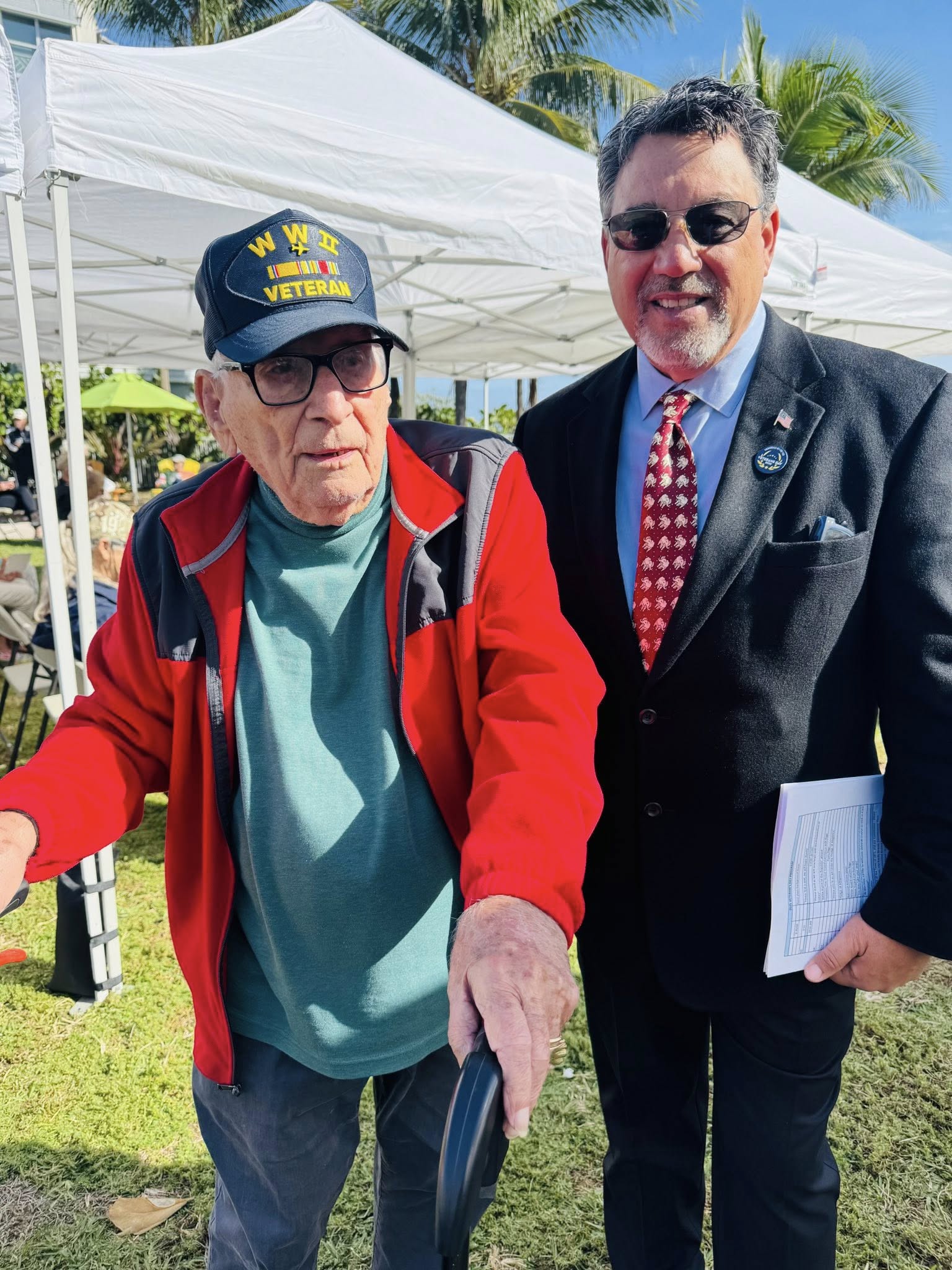 Randy Strauss standing with a World War II veteran at a community ceremony